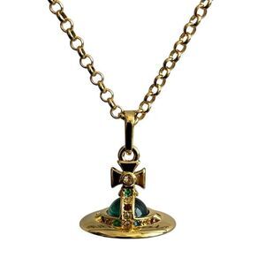 NIB Vivienne Westwood gold petite Saturn orb green crystal chain necklace